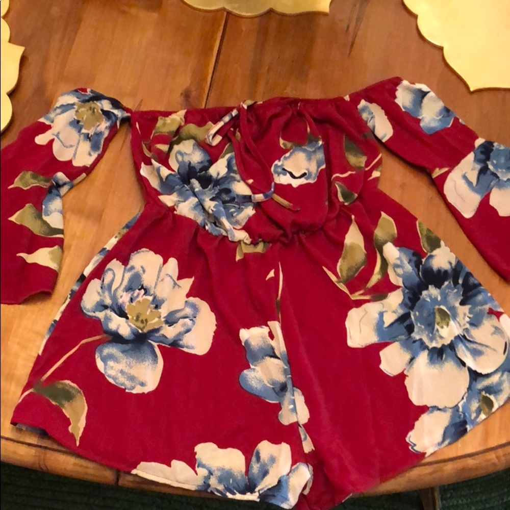 Red floral romper w long sleeves